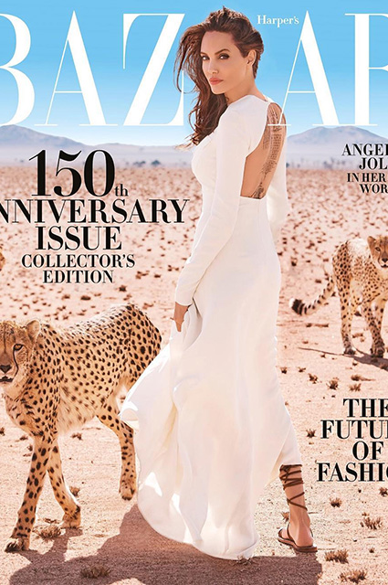 Хищная красота: Анджелина Джоли в дерзком платье томно позирует с гепардами! Фото